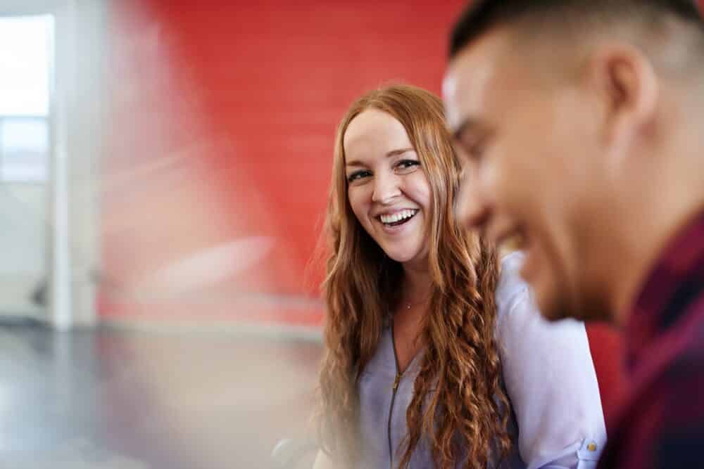 Laughing woman with laughing man