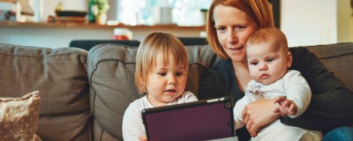 Mother reading to kids