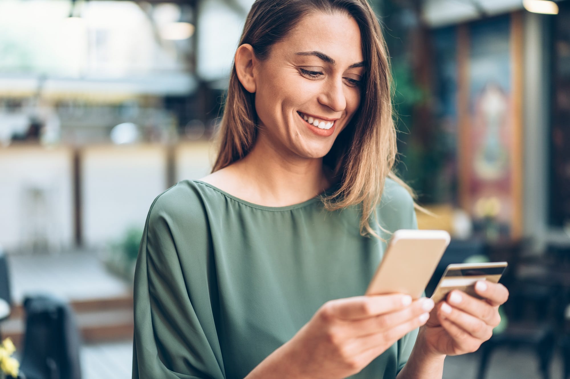 Woman online shopping on phone